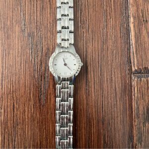 Citizen  women’s watch stainless steel white round face rhinestones needs repair